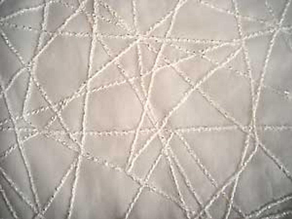 Фото 3. Увеличенный фрагмент декорированной ткани.